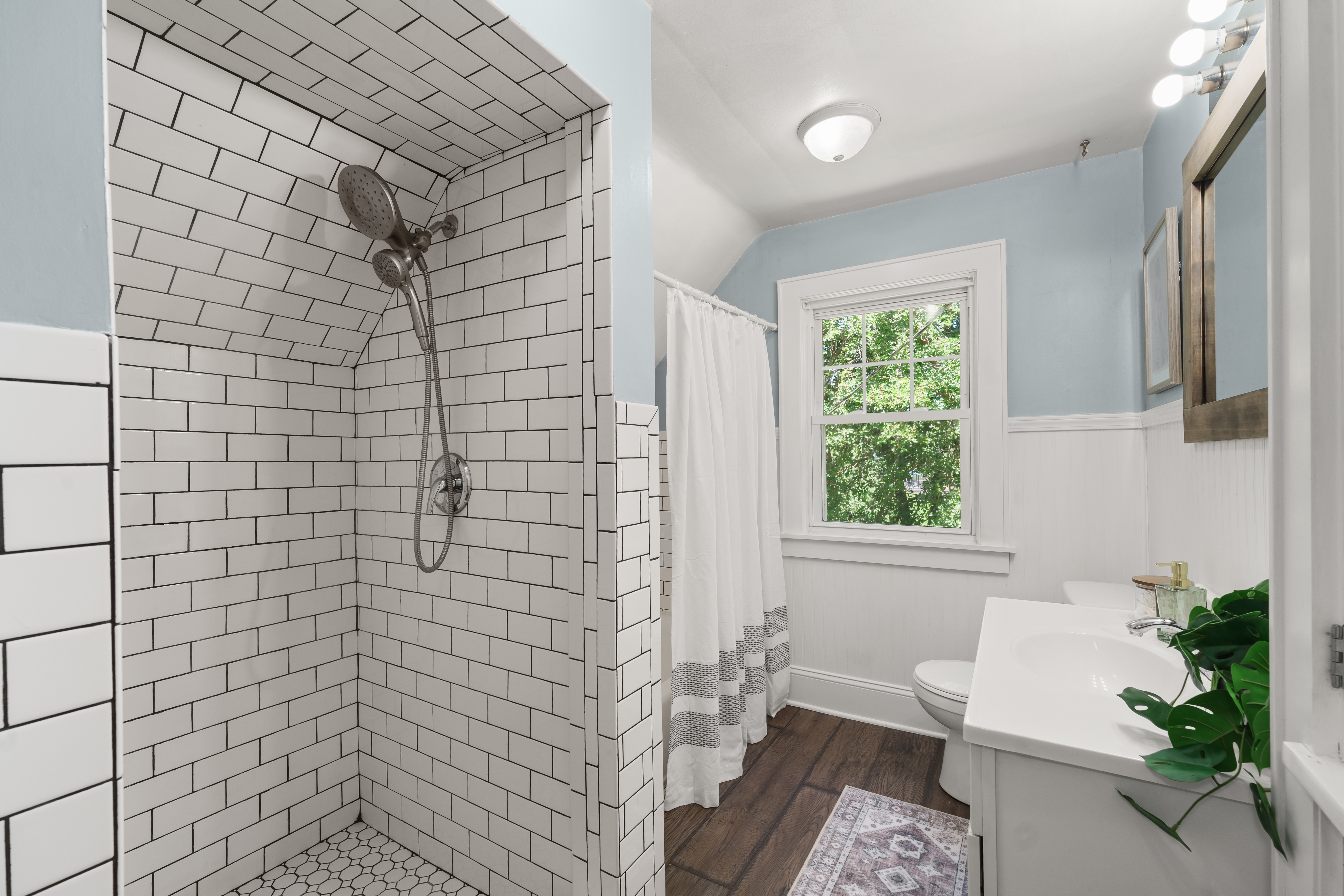 Bathroom with white subway tile walk-in shower