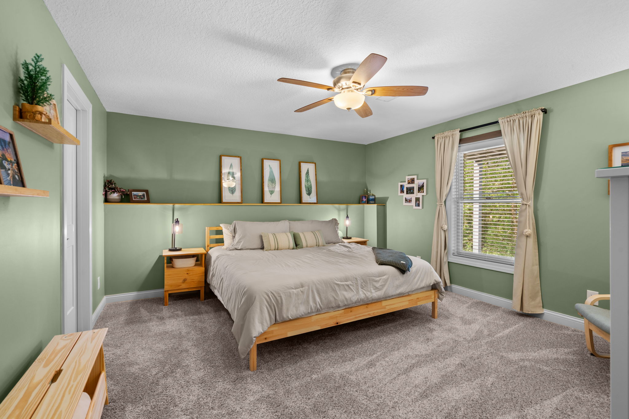 Bedroom with sage green accent walls